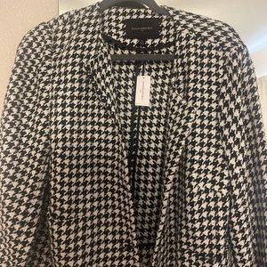 This is a coat from Banana Republic. Never worn. Brand-new. Great condition
